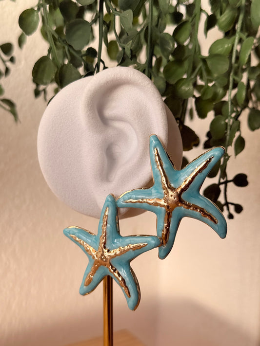 Pendientes acero estrella azul
