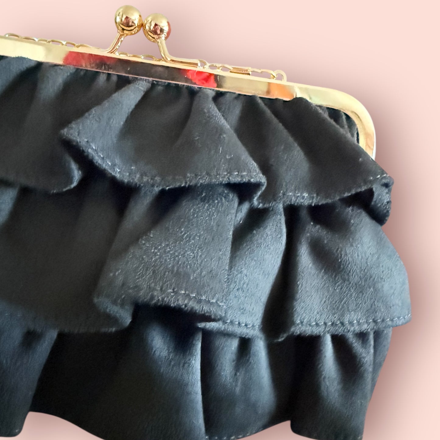 Bolso volantes negro