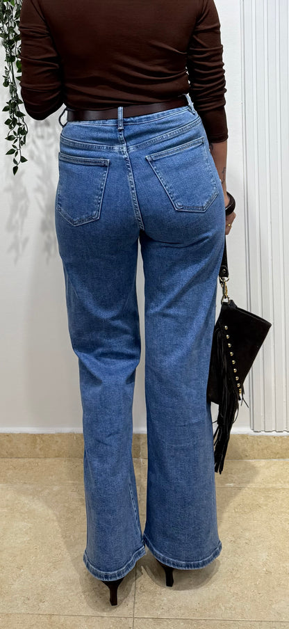 Jeans azul wide leg tachas