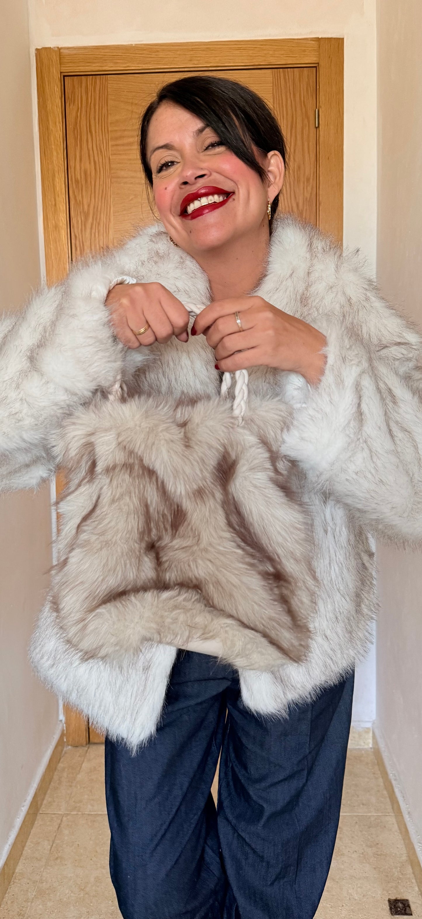 Bolso pelo combi blanco y negro