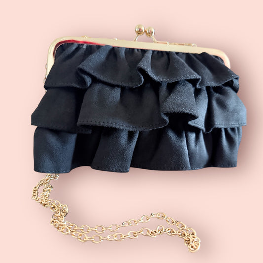 Bolso volantes negro