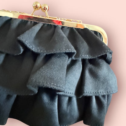 Bolso volantes negro